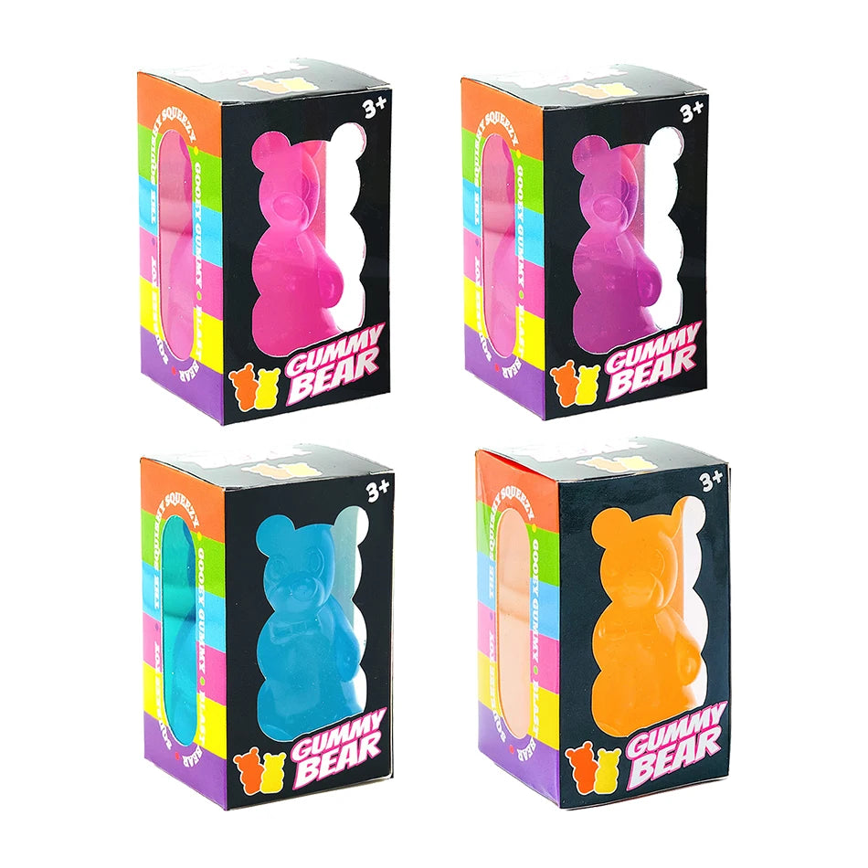 A set of four gummy bear sensory fidget cubes in pink, purple, blue, and orange.