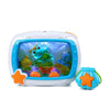 A white ocean-themed crib soother with a clear window showing colorful marine animals.