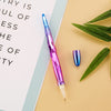 A purple diamond painting pen is shown next to a green leaf on a light beige background.