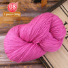 A ball of bright pink premium alpaca blend yarn used for knitting or weaving.