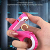 A hand holds a pink magnetic fidget card with a spinner, demonstrating its opening and closing mechanism.