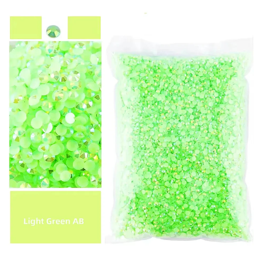 Bag of light green AB-coated resin rhinestones for crafts and DIY projects