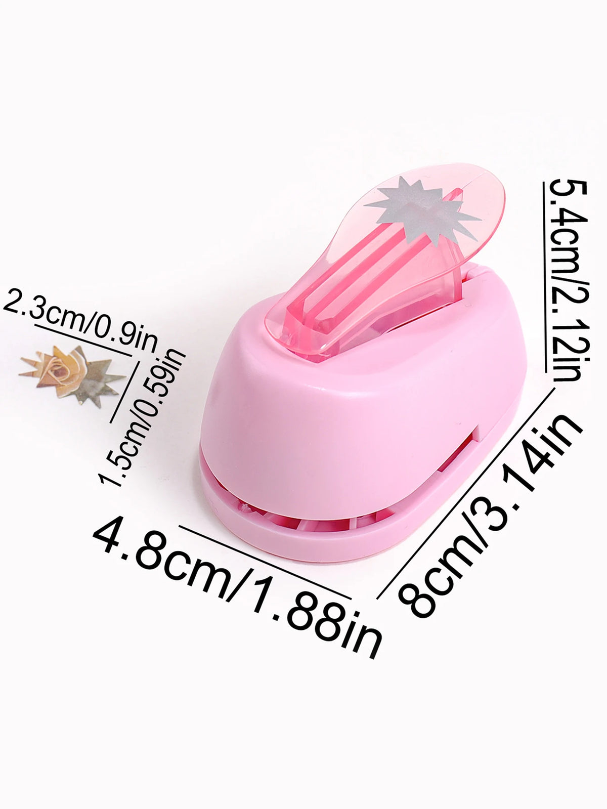 Pink lever action embosser tool with a plastic handle and a metal die for scrapbooking
