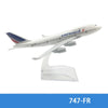 Diecast model of an Air France airplane in white and blue livery.