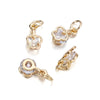 Gold and silver rhinestone heart charms for jewelry making displayed on a white background.