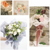 A collection of floral bouquets wrapped in translucent tissue paper and presented in various styles.