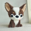 A brown and white Chihuahua plush doll with large eyes and a pink tongue sticking out.