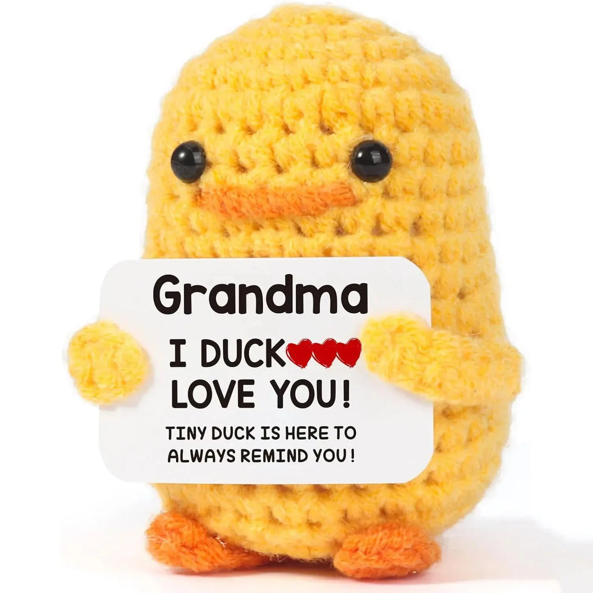 Handmade crochet yellow duck doll with a smiling face and orange feet