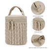 Beige quilted organizer bag with a leather pull head and Velcro adjustment for a baby stroller caddy