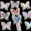 A collection of sparkling crystal butterfly beads and components for jewelry making