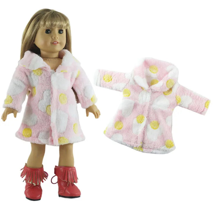 A plush pink and white faux fur coat with yellow polka dots and red boots for a doll.