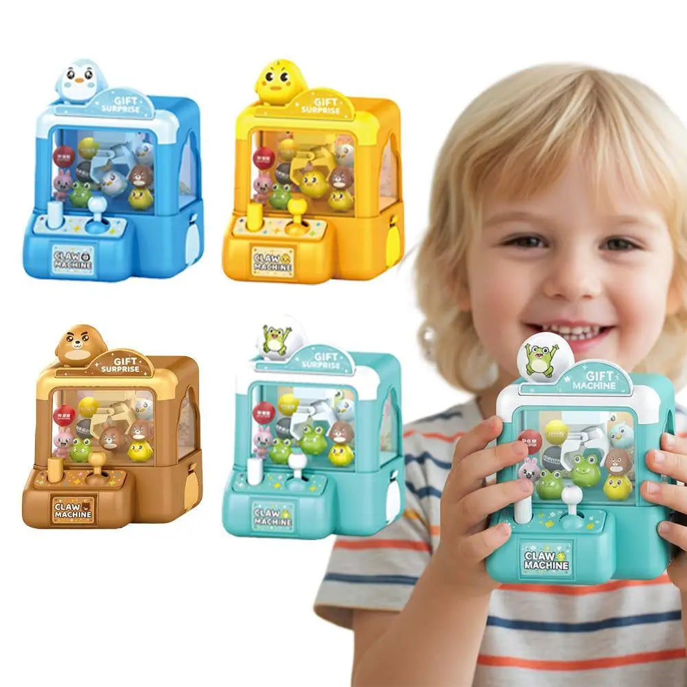 Three versions of a mini claw machine toy for kids in blue and yellow, being held by a young child.