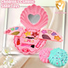A pink cosmetic shell toy set for children featuring various makeup products and seashell accessories.