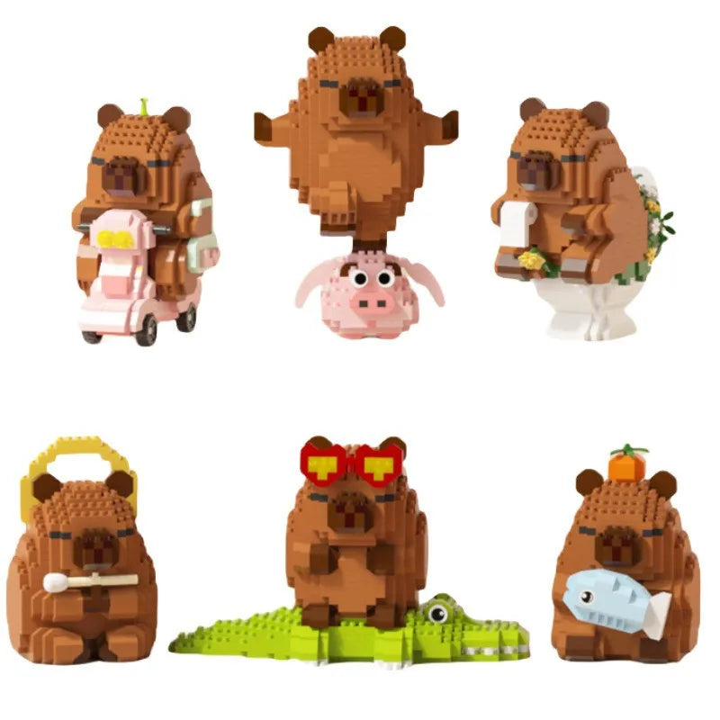 A set of four cute brown animal models made from micro building blocks, including a bear, a pig, and a capybara.