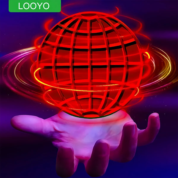 A glowing red sphere is held by a hand, surrounded by bright light rings.