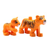 A set of orange zoo animal building blocks featuring a lion, bear, tiger, elephant, and panda.