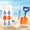 A set of orange and white plastic excavator digging toys for sand and snow are shown on a beach.