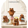 A set of cute brown bear and pink capybara micro building blocks displayed on a white surface.