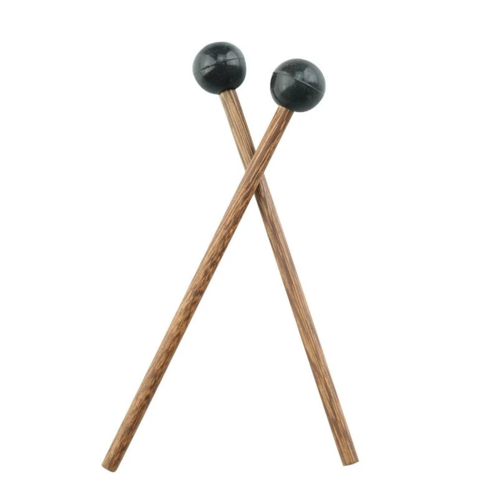A pair of wooden handpan drum mallets with black silicone tips