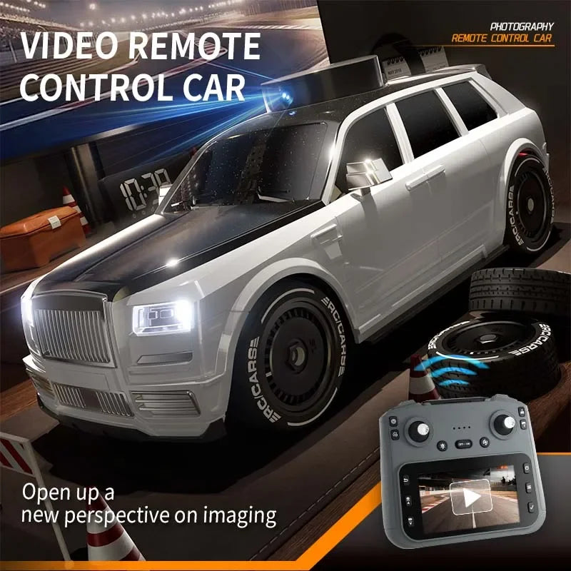 A white 4WD RC drift car is shown with an FPV monitor and remote control in a dark setting.