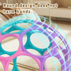Grip sensoriel rond et multicolore avec des trous pour nourrissons.