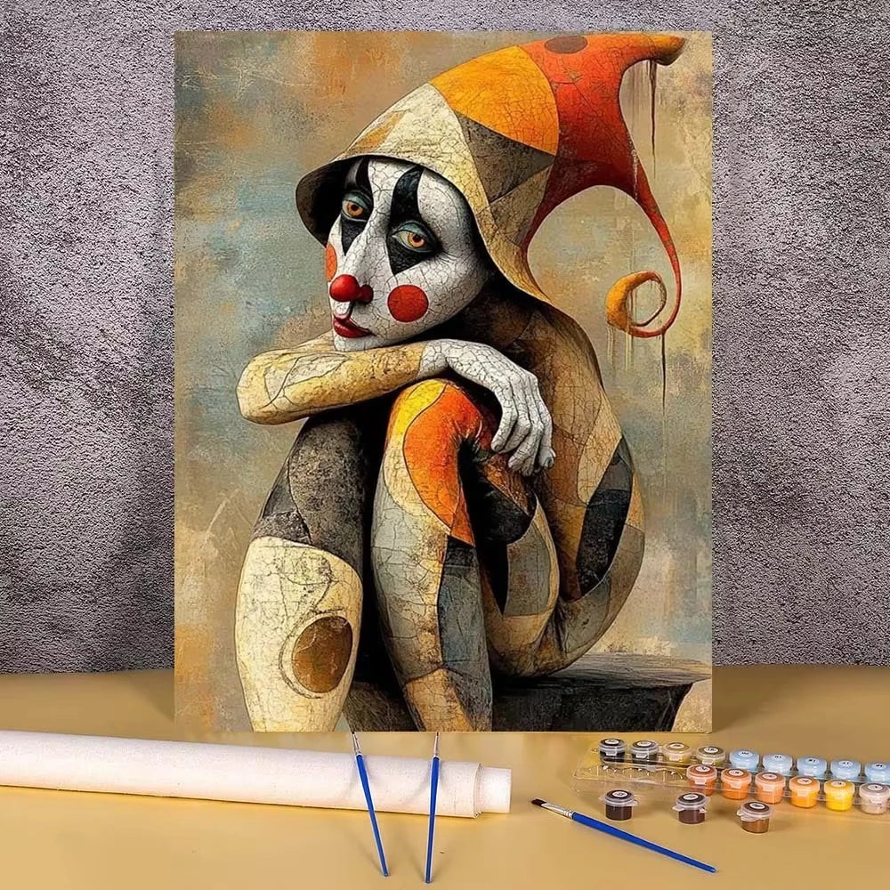 A painting of a stylized clown face in shades of orange, black, and white on canvas.