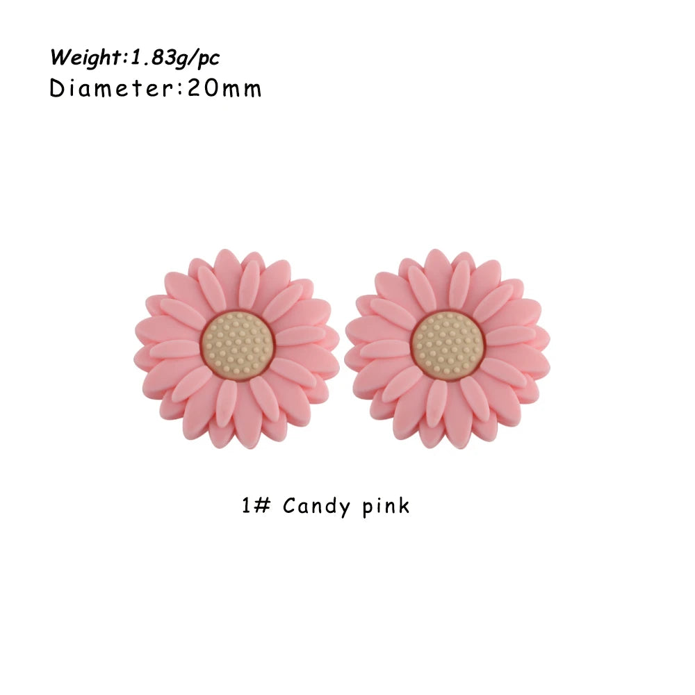 Pair of pink daisy sunflower silicone beads with a yellow center for DIY jewelry making