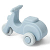 A light blue silicone toy car designed for toddlers, featuring a smooth body and large wheels.