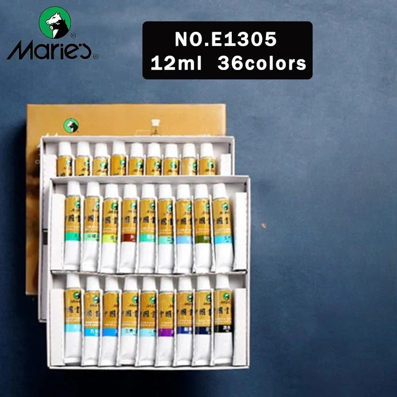 A box of Marie's Chinese Painting Pigments containing 36 colors in 12ml tubes is displayed on a dark surface.
