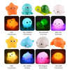A set of LED light-up bath toys featuring various sea creatures like a star, octopus, tortoise, lion, whale, and penguin.