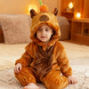 A baby wearing an adorable orange-brown animal hooded romper sitting on a light rug.