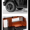 A black pickup truck with an V8 turbo engine and a custom wheel, shown alongside the interior of an RV camper truck model.