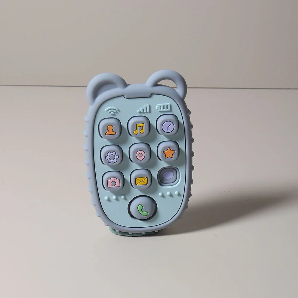 A light blue silicone teether shaped like a phone with various buttons for babies.