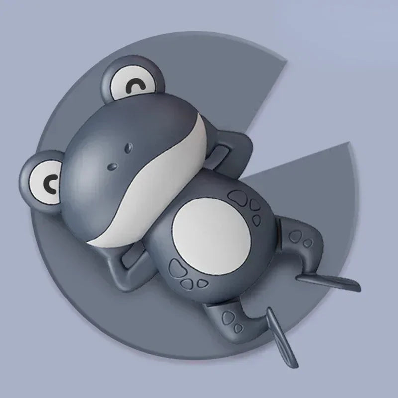 A gray wind-up swimming duck bath toy for toddlers with white accents, shown in a side view.