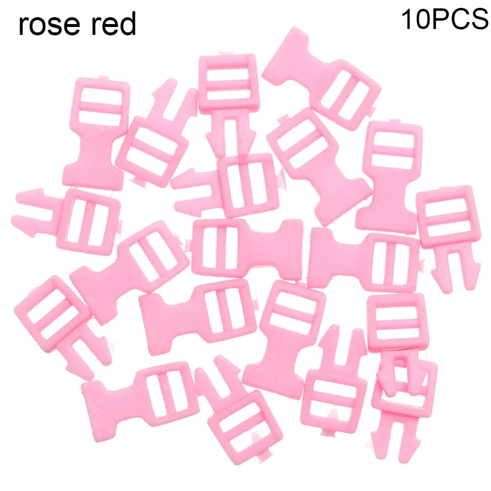 A collection of 10 pink rose red mini plastic buckles for DIY crafts and outdoor gear.