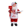 A festive Santa Claus figurine with a white beard and red hat, wearing a red and white outfit, holding a sign that says WELCO
