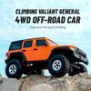 Orange 1:18 scale 4WD off-road RC Jeep climbing on rocky terrain.