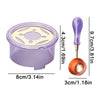 A purple wax seal melting kit featuring a pot, heater, and a metal spoon for sealing wax.