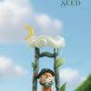 A small figure of a elf sits in a tree, surrounded by leaves and clouds, with text about dreams and comfort.