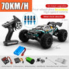 A black brushless 4WD monster truck RC car is shown with various accessories and dimensions.