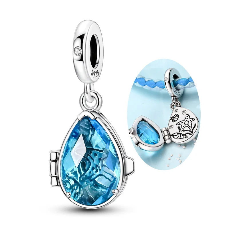 Sterling silver ocean life charm pendant set featuring starfish, sea turtle, and whale shark charms