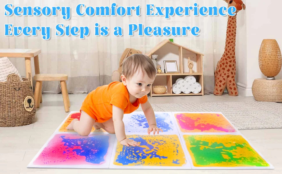 A colorful liquid sensory play mat with various colored liquids for kids is laid out on the floor.