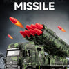 A diecast military missile truck toy is shown launching a missile against a dark background.