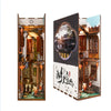 A DIY book nook kit featuring a detailed miniature scene with traditional architecture and LED lighting.