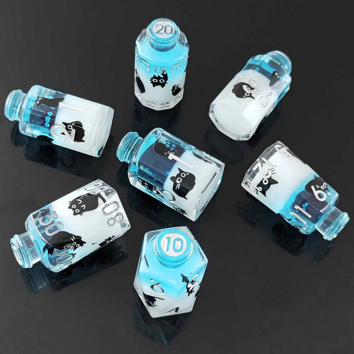 A set of seven floral resin potion bottle polyhedral dice, featuring various numbers and symbols.