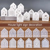 A collection of clear silicone light signs shaped like houses, featuring designs for home, sweet home, and love.