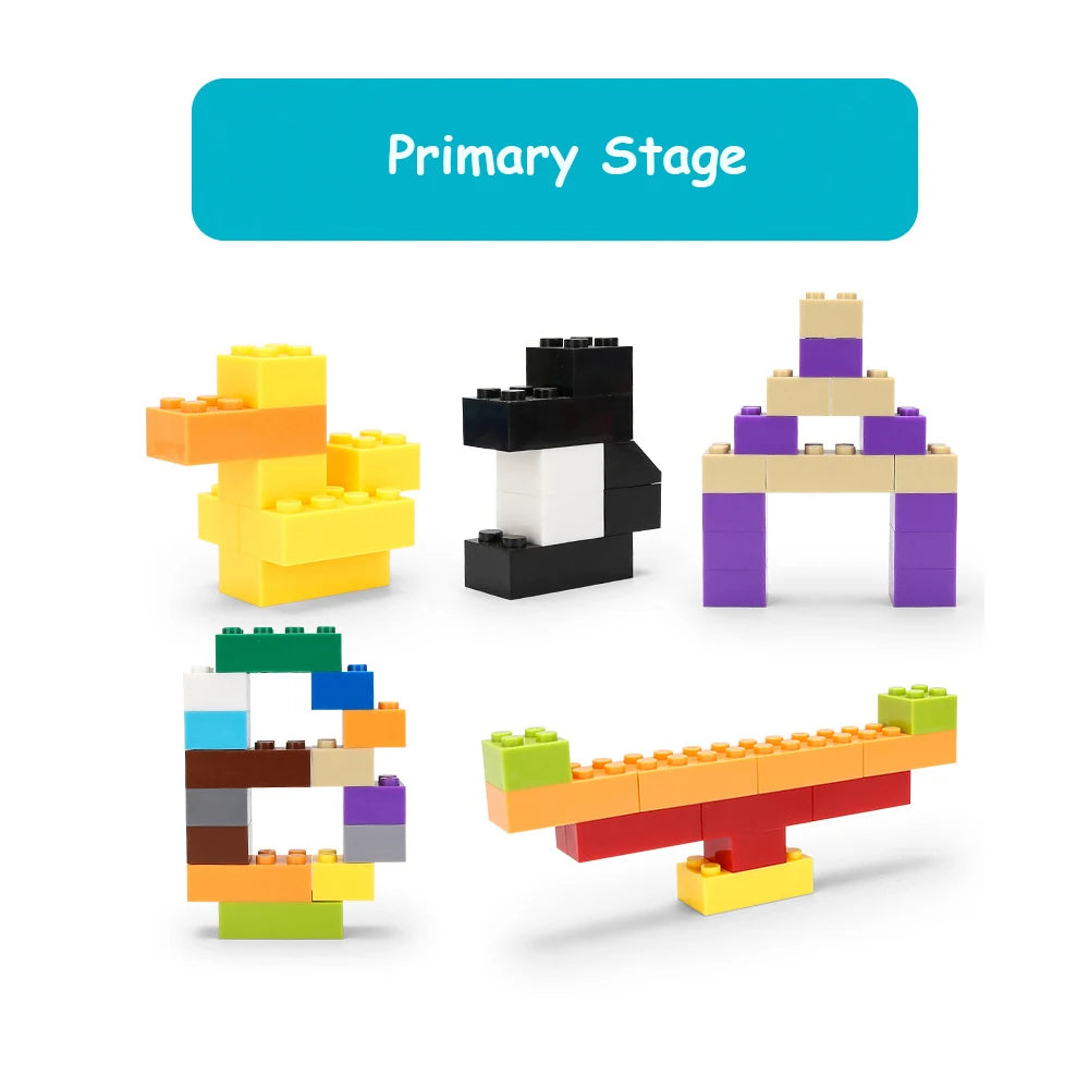 A set of yellow and black building blocks arranged in a primary stage formation.