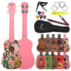A pink ukulele with a floral body, neck, and accessories including a strap and tuner.