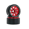 A black beadlock wheel with a red center and removable hex hub for an RC crawler.