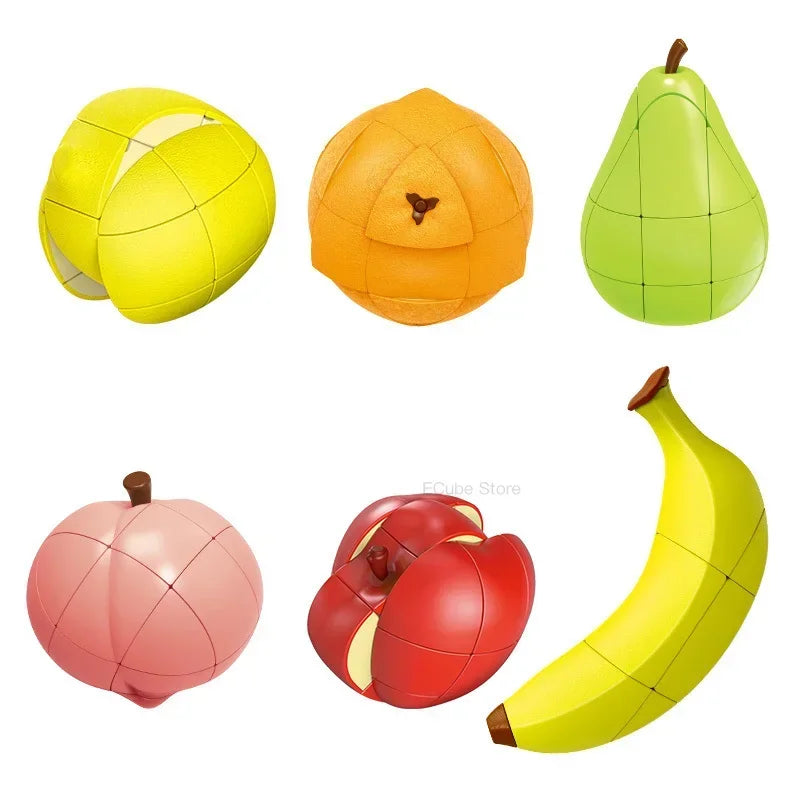 A collection of fruit-shaped 3x3 puzzle cubes including a lemon, orange, pear, pumpkin, and banana.